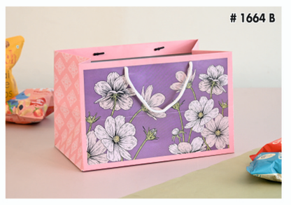 Floral-patterned gift bag with pink border on a beige background